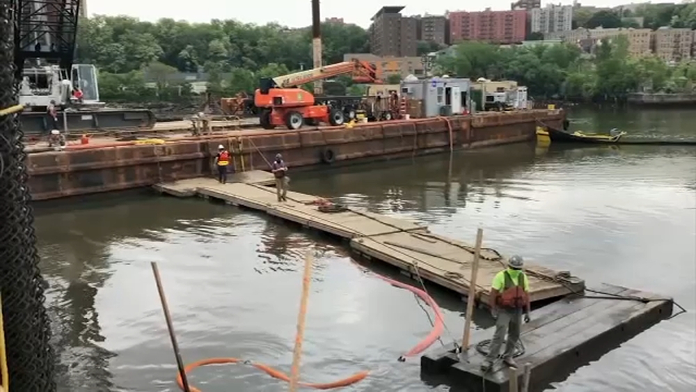 JFK's WWII era patrol boat is raised from Harlem River
