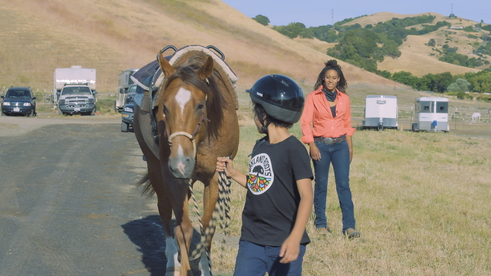Woman rides her horse to Oakland protest