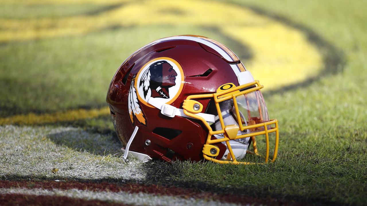 Washington Redskins helmets sits on the field before the start of an NFL football game between the Washington Redskins and the Philadelphia Eagles, Sunday, Dec. 15, 2019, in Landover, Md.