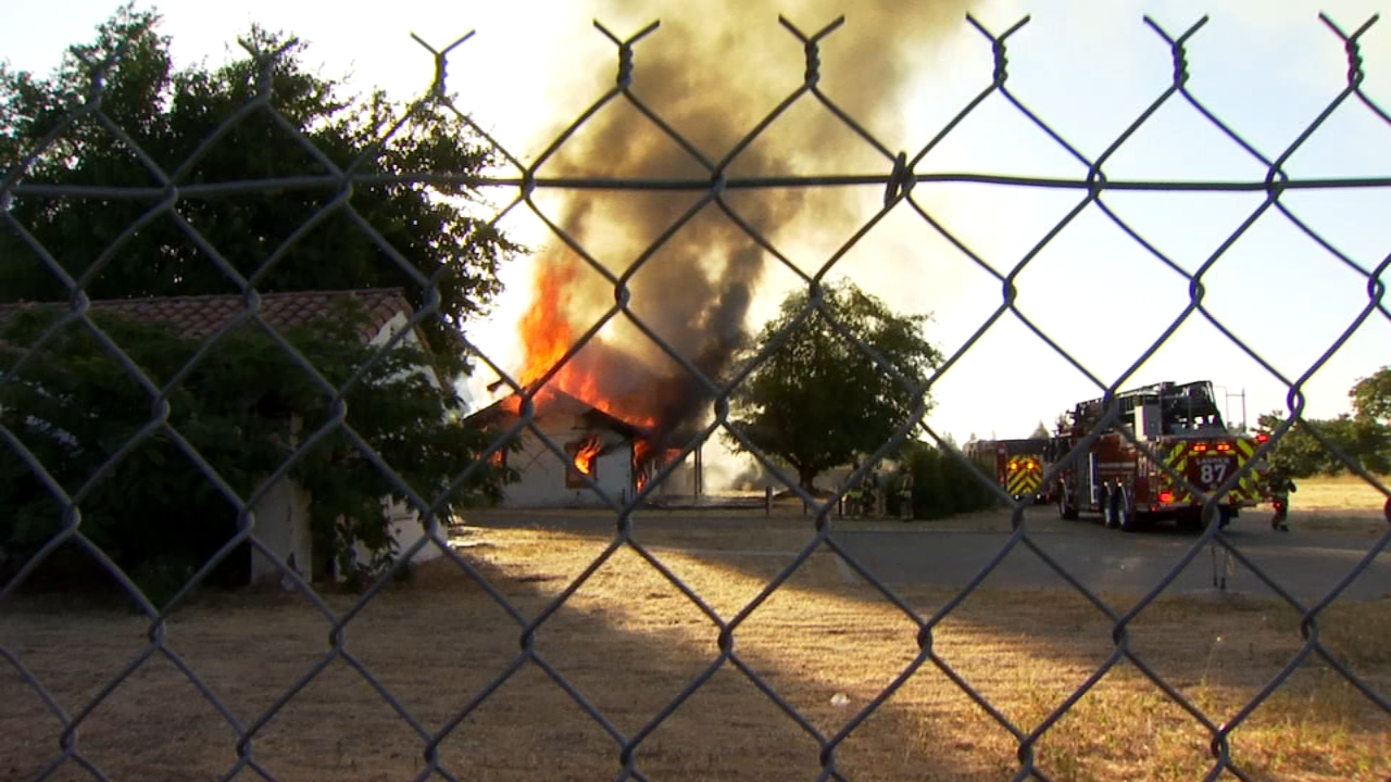 Firefighters battling fire at vacant building in southeast Fresno