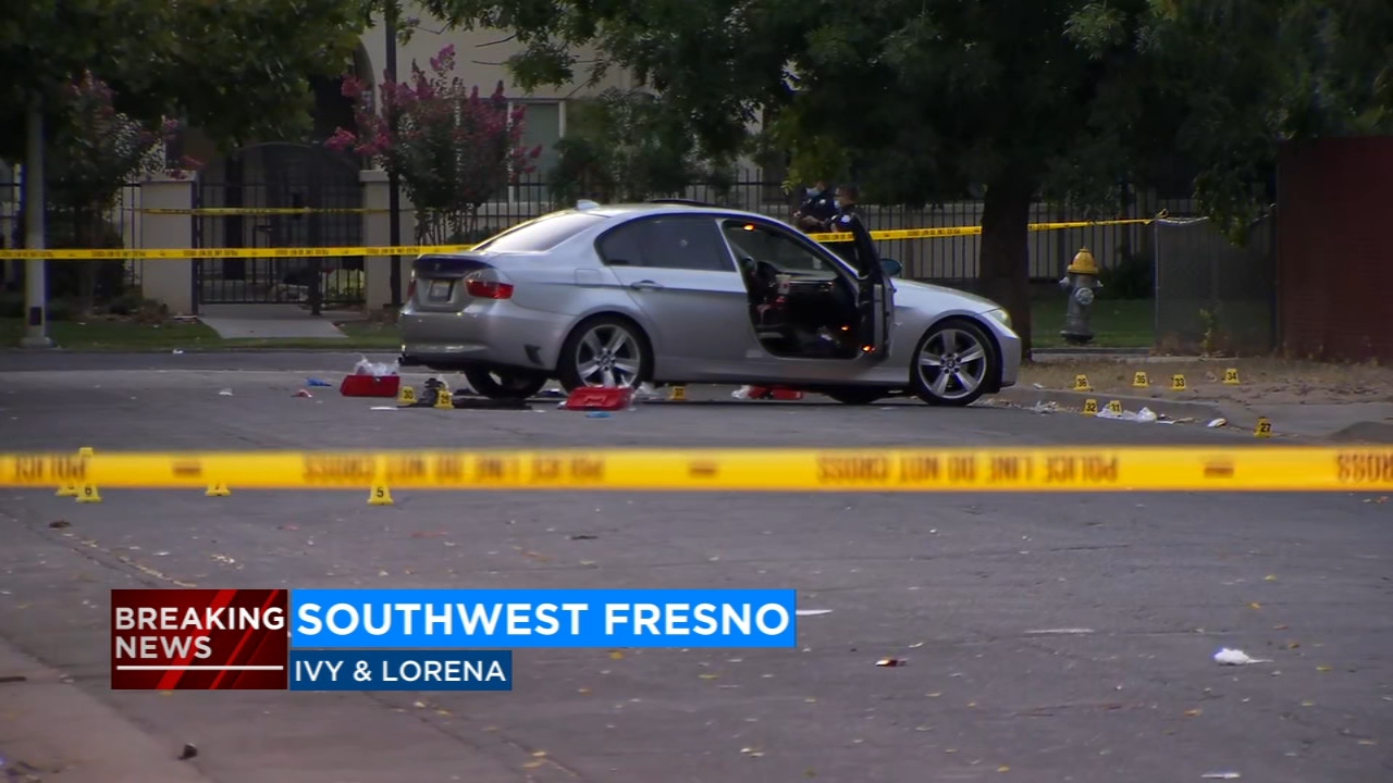 Man killed, woman injured after suspects open fire on car in southwest Fresno