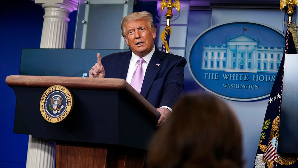 Trump praises QAnon conspiracists, suggests he appreciates support