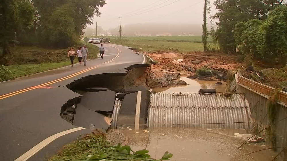 SCENE VIDEO: 2 children missing after flash flood washes away Smithfield road