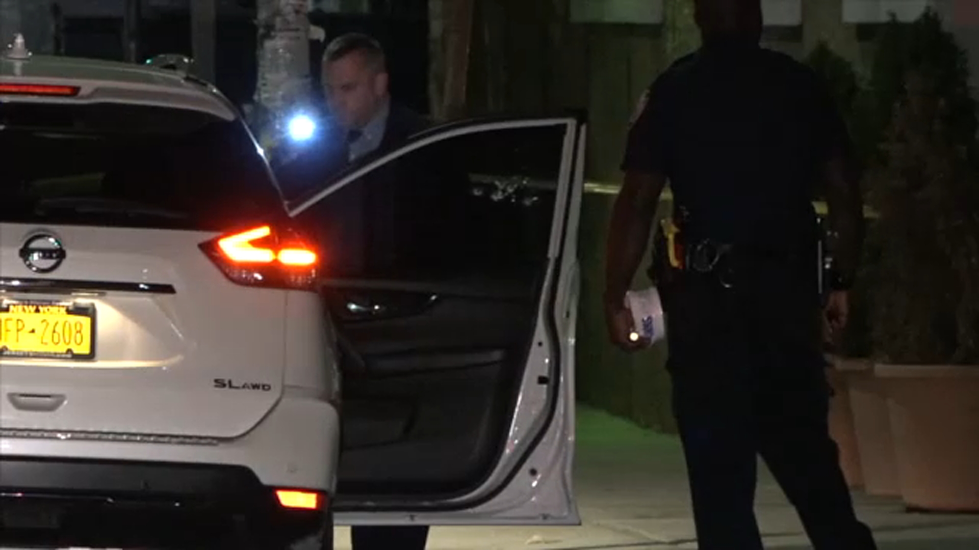 Man shot dead while sitting inside car in Queens