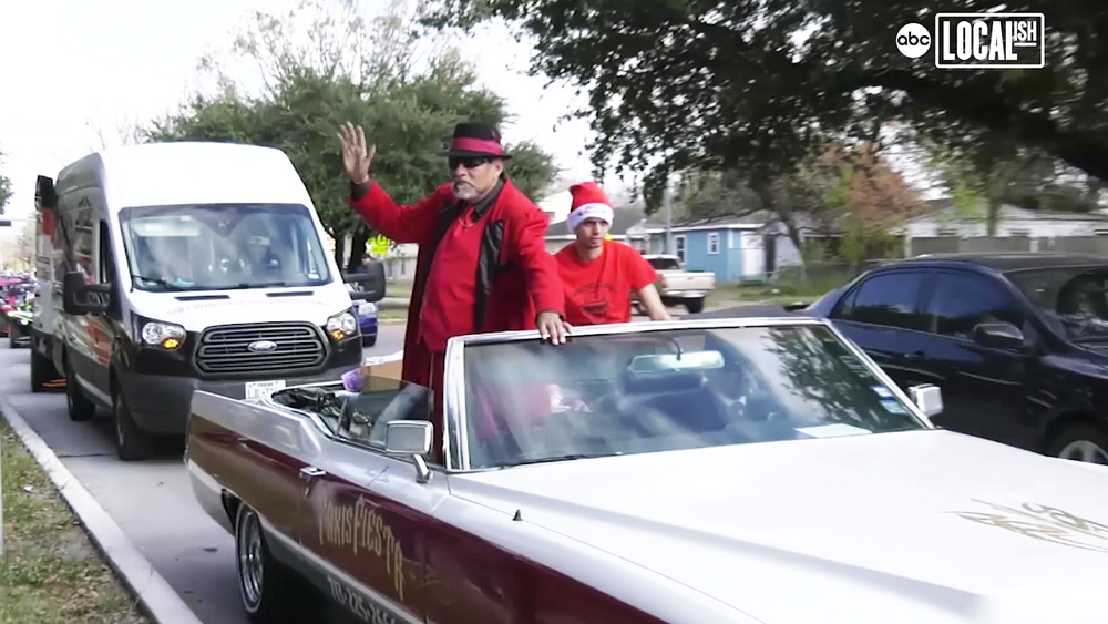 This version of Santa wears a zoot suit and has a lowrider 