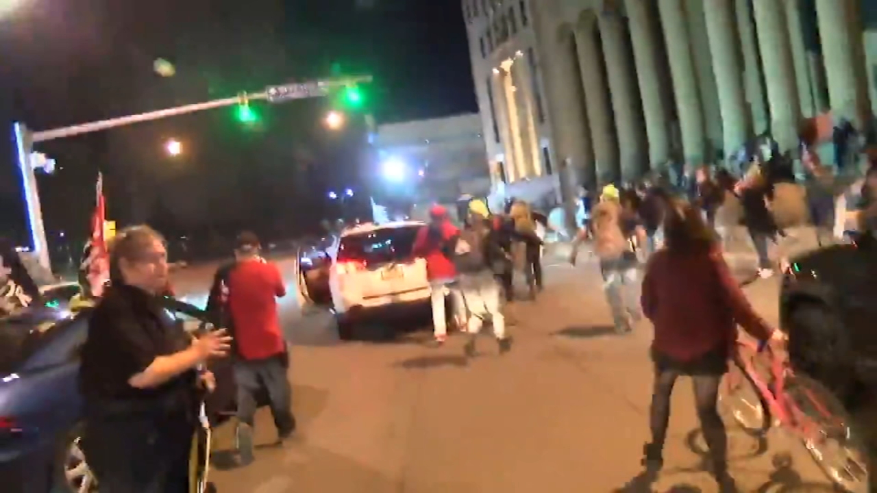 Pickup truck drives through protesters in Buffalo, injuring 1 - Video