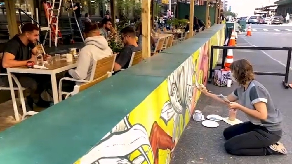 Artists transform outdoor dining areas into works of art