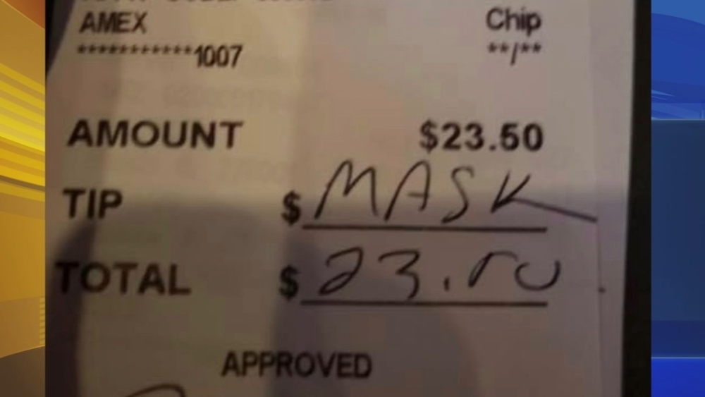 Instead of a tip, waitress finds "MASK" written on receipt
