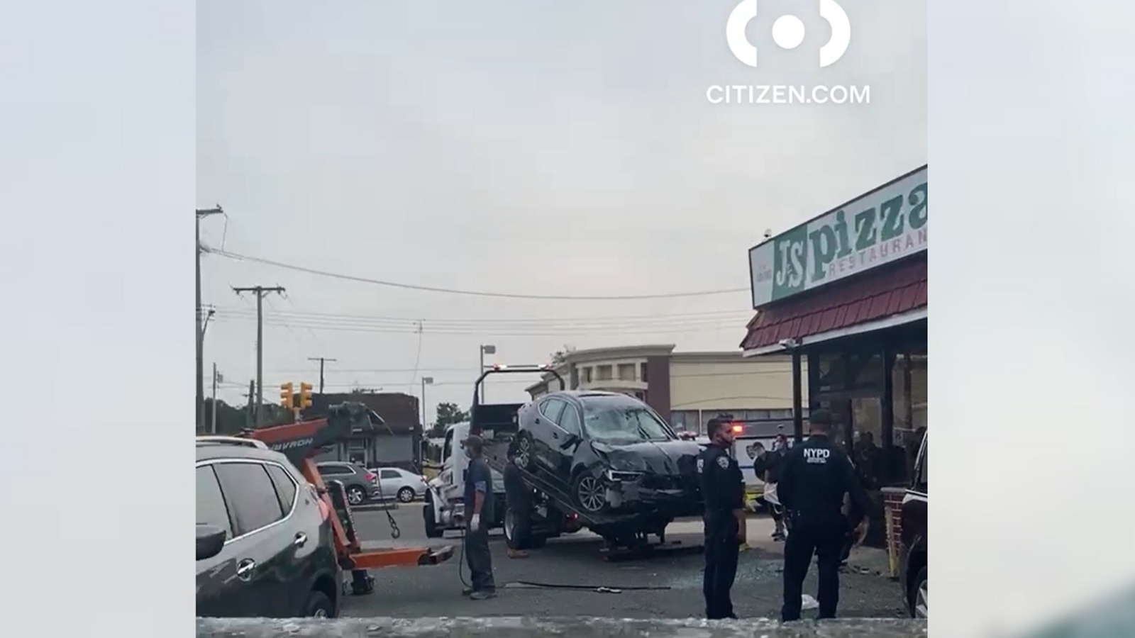 Multiple people injured when car crashes into Queens pizzeria - ABC7 ...