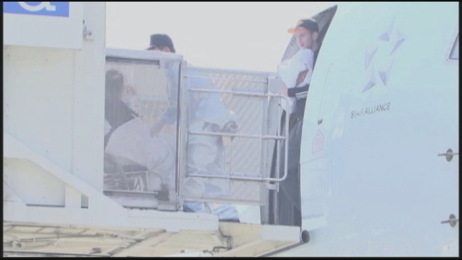 RAW VIDEO New parents exit plane after surprise baby born during