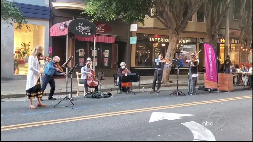 San Francisco Ballet orchestra plays for outdoor diners, passerby