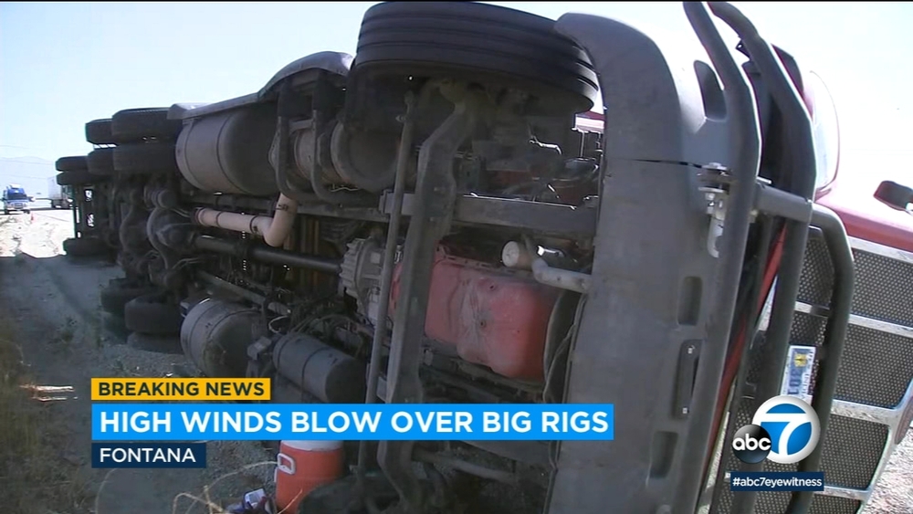 High winds topple big rigs on 15 Freeway in IE