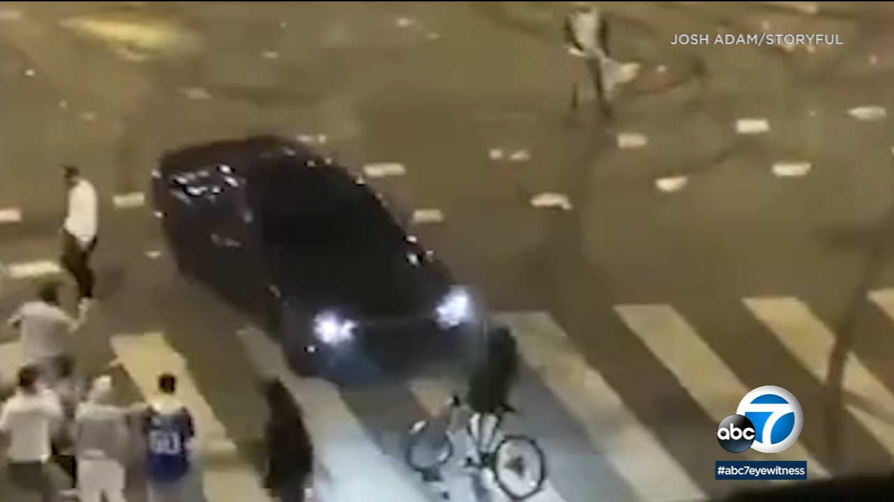 Video shows bicyclist hit by driver during Dodgers celebration