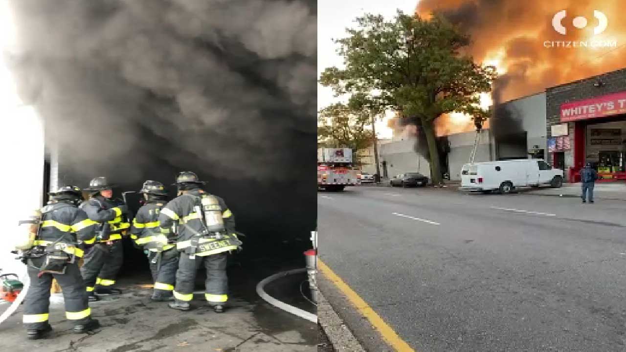 Auto repair shop destroyed by massive fire