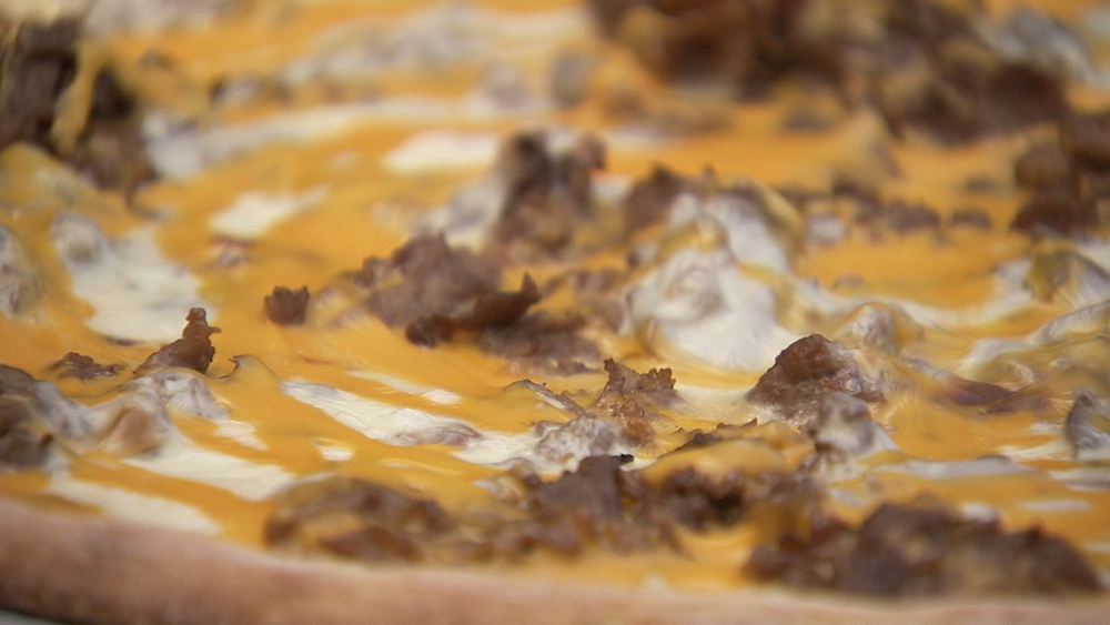 Cheesesteak meets pizza in an epic foodie collaboration