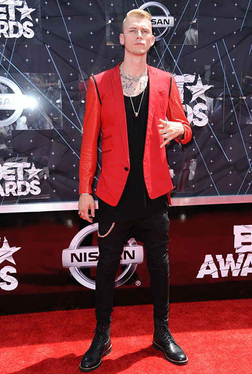 Machine Gun Kelly arrives at the BET Awards at the Microsoft Theater on Sunday, June 28, 2015, in Los Angeles.