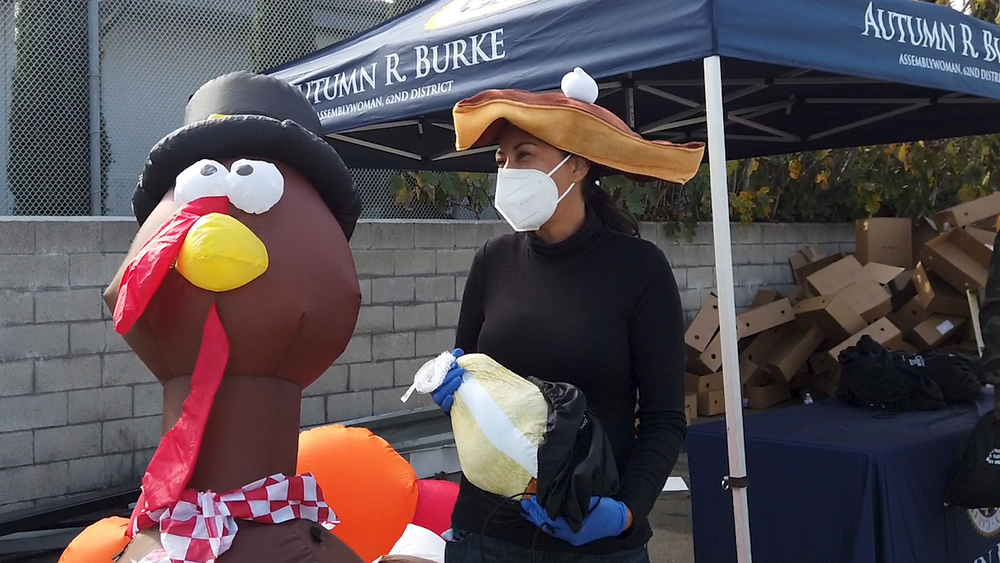 Families line up in Lennox for free turkeys and essential items