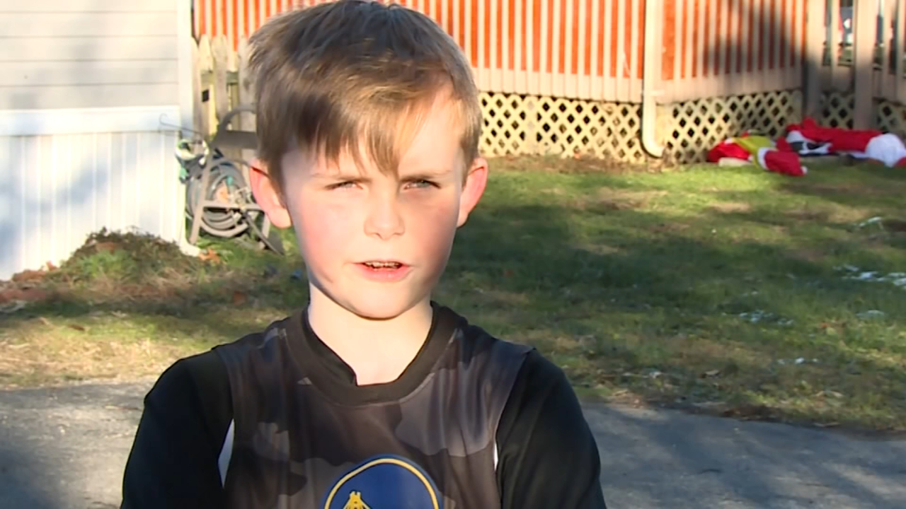 FedEx driver surprises boy with new basketball, hoop