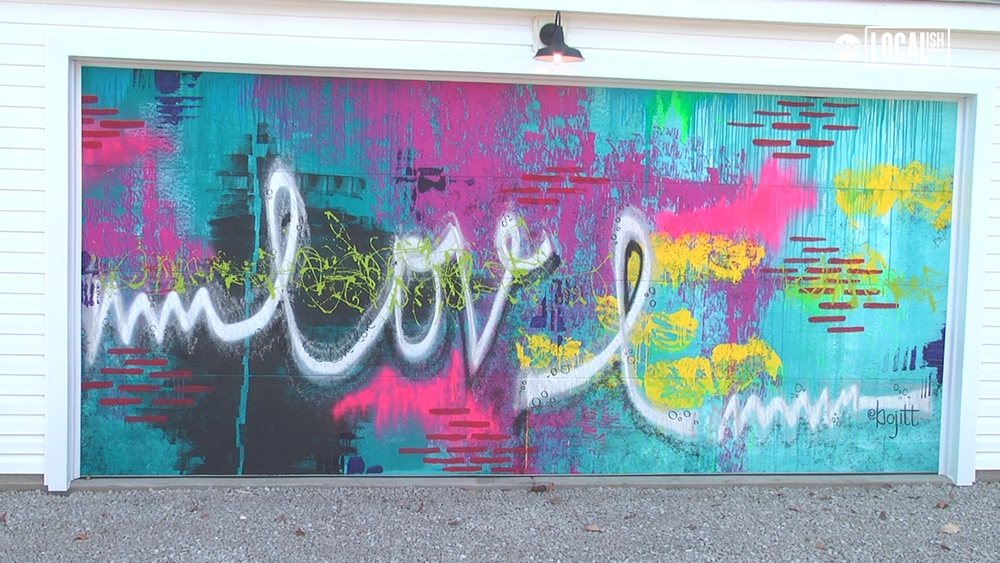 Bright murals line this Chicago alley