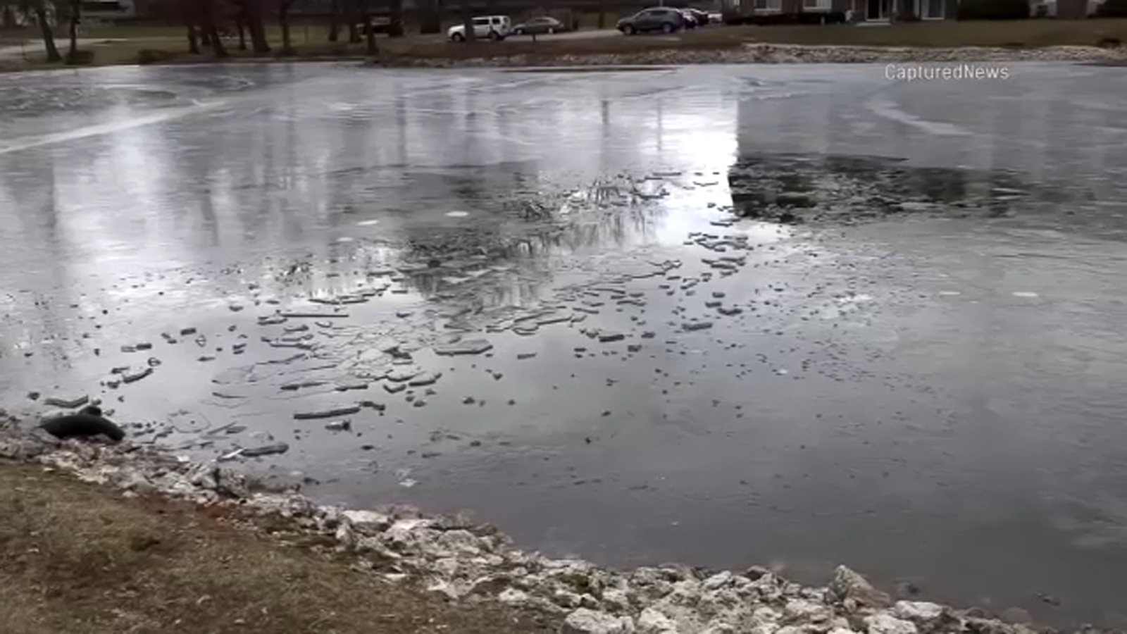 Fox Lake boy rescued after falling through thin ice atop retention pond ...