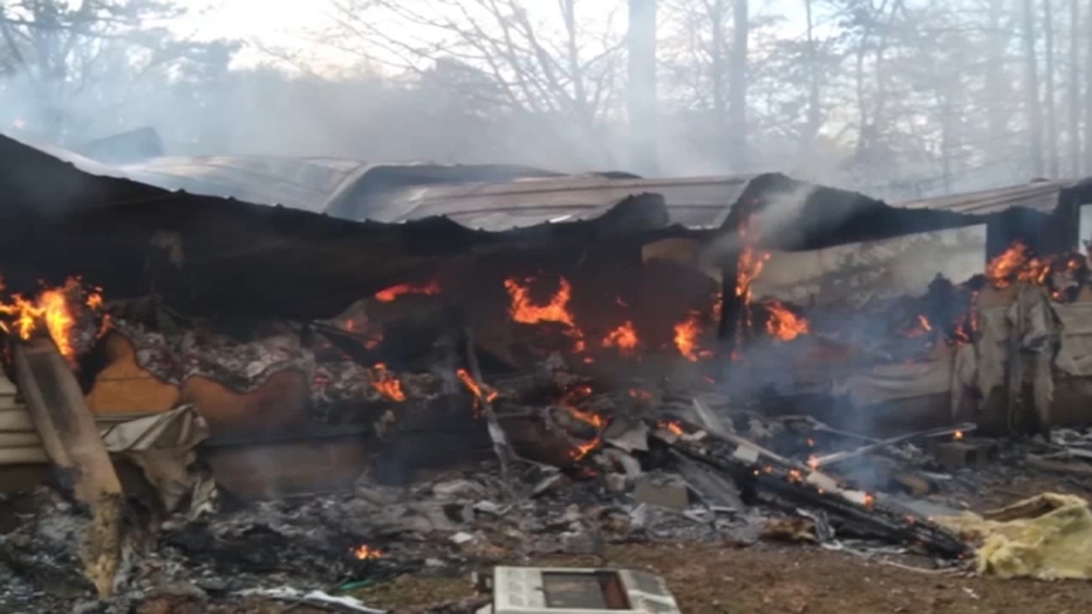 Boy rescues baby sister from house fire
