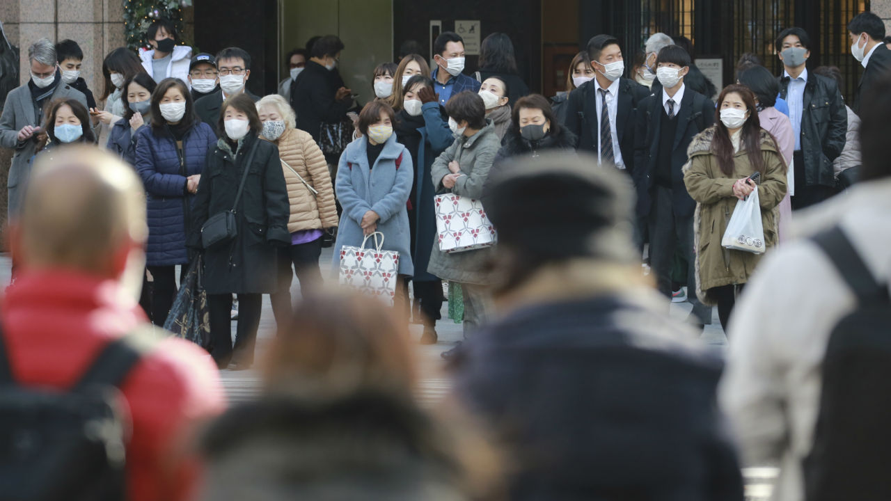 COVID news: France, Japan report cases of new virus strain, latest on stimulus bill