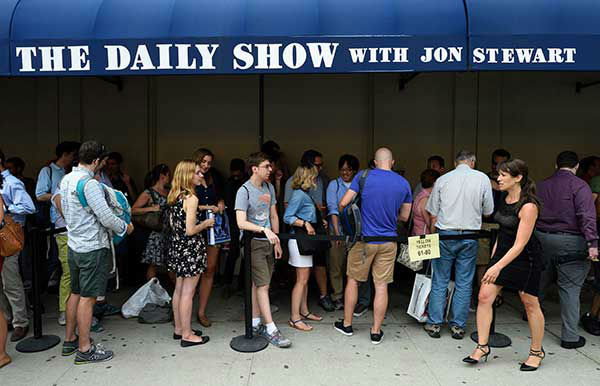 Fans wait outside before Jon Stewart's last time hosting ''The Daily Show.''