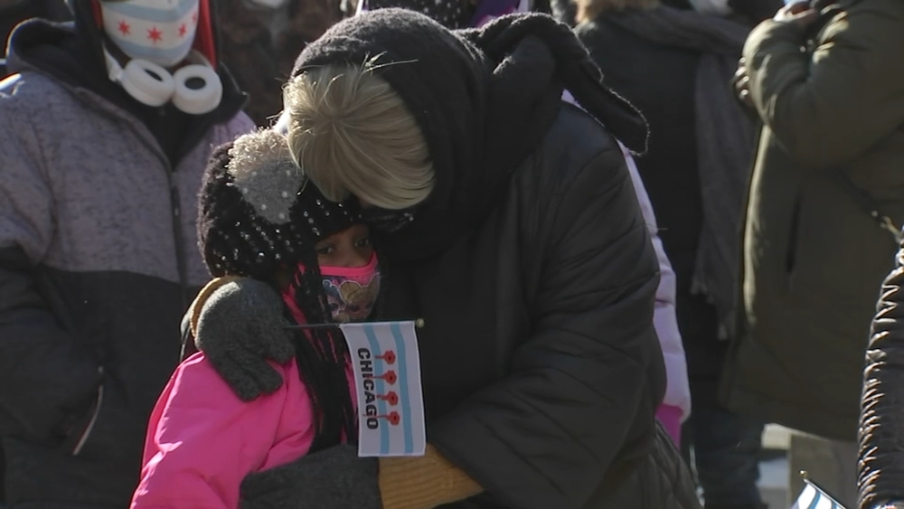 Demonstrators march to draw awareness to 'virus of violence' in Chicago as 2020 ends