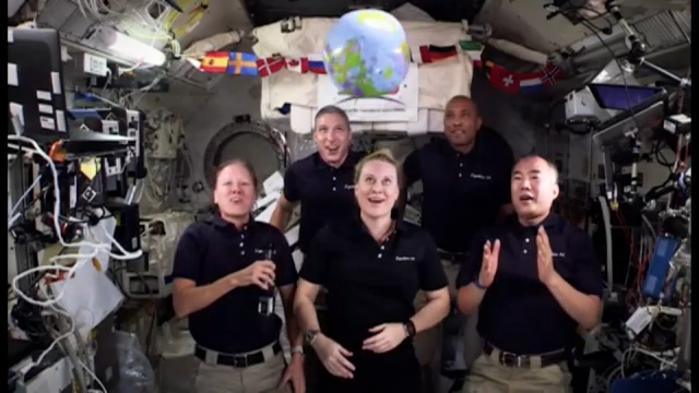 NASA crew perform reverse ball drop on New Year's