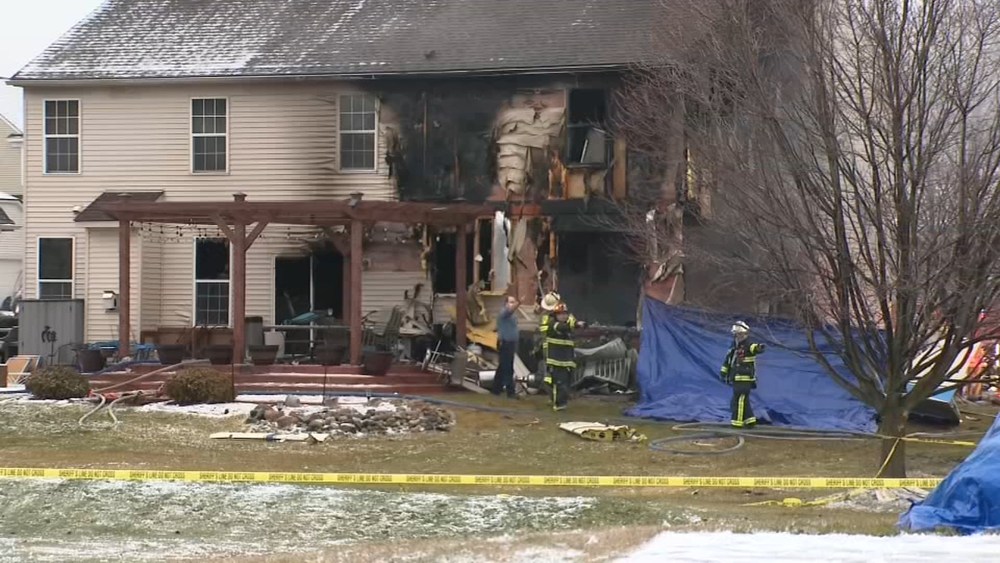 Small plane crashes into Michigan home, killing 3