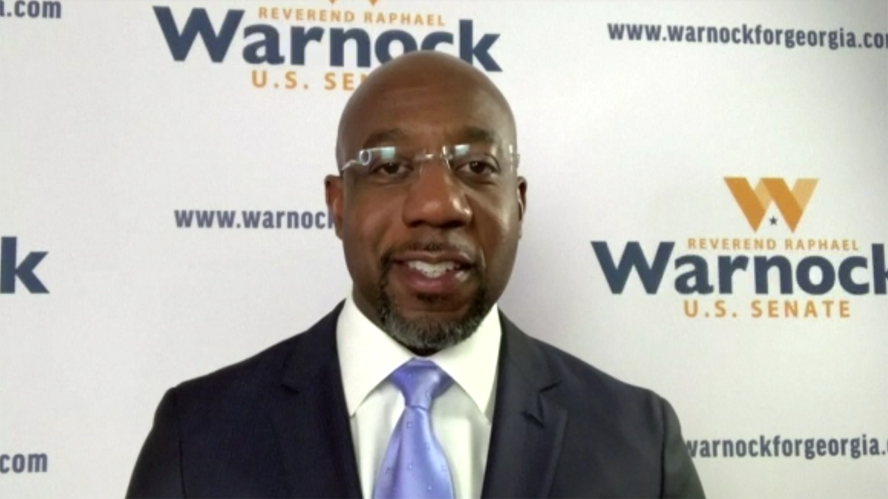 Raphael Warnock calls runoff victory 'a historic moment'