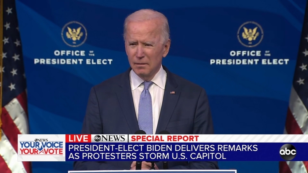 Biden denounces rioters' violence at Capitol