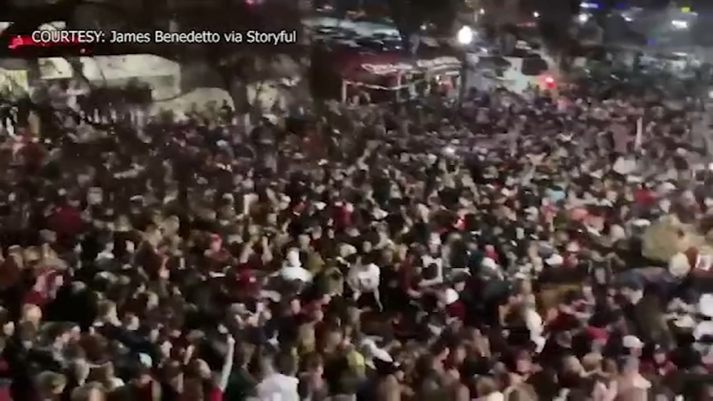 Crowd celebrates Alabama's win, despite COVID-19 rules