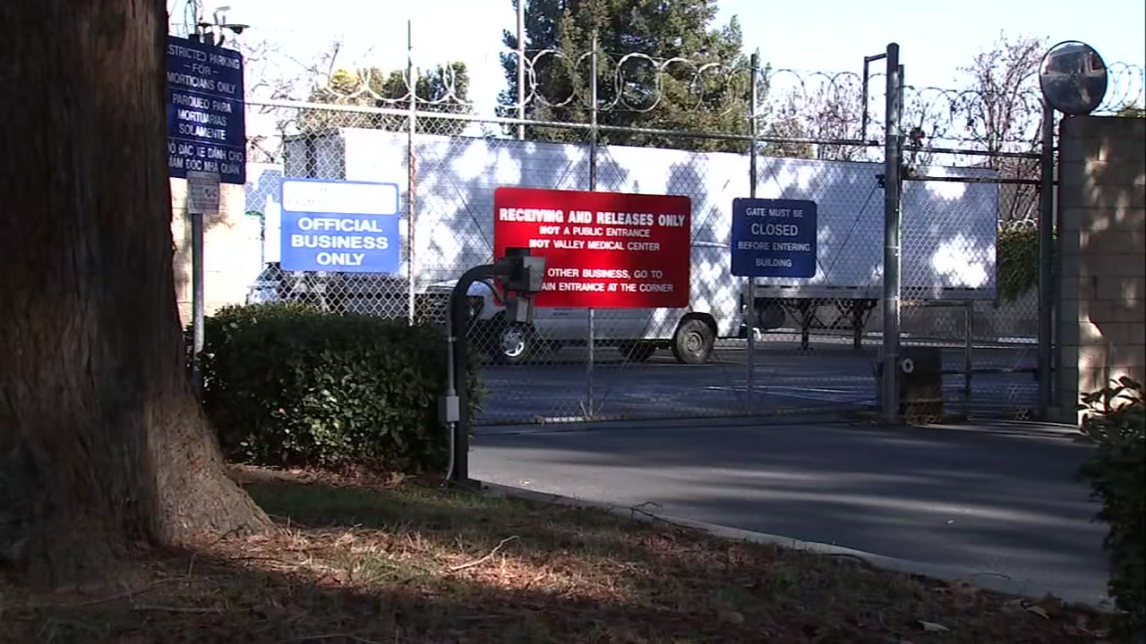 Hospitals bring in refrigerated trailers as COVID-19 deaths rise
