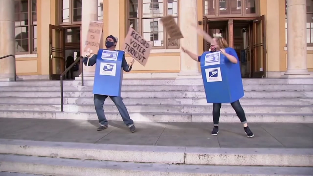 People dress as dancing mailboxes in very Berkeley celebration